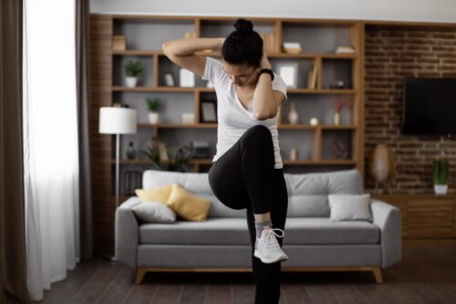 woman working out at home