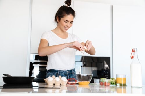 woman making protein filled lunch